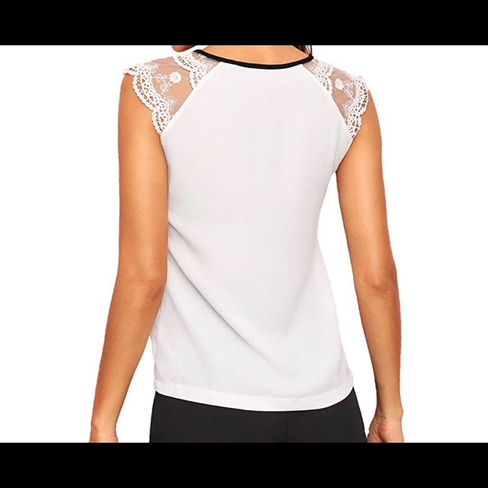 White shirt with a black tie